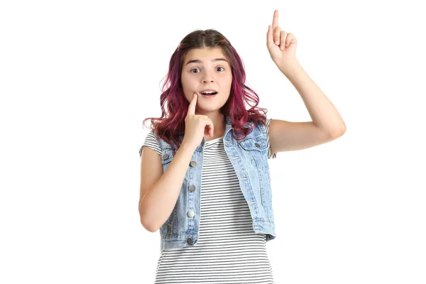 Krásná mladá dívka ukazující prst na bílém pozadí — Stock fotografie