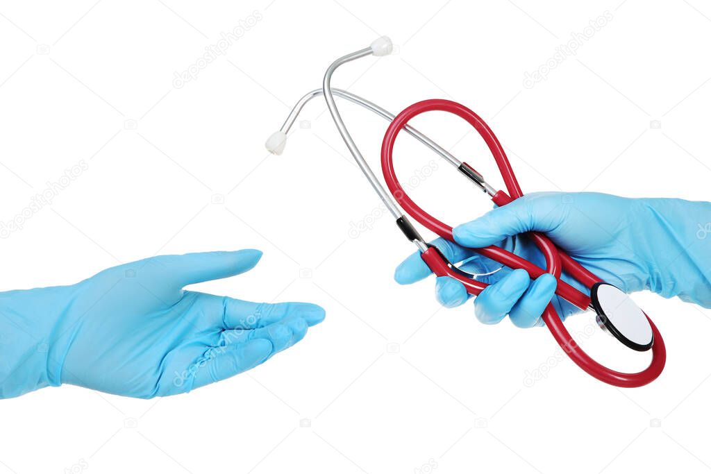 Doctor hands in gloves holding stethoscopes on white background