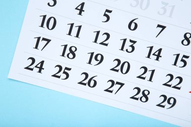 Mavi arkaplanda kağıt takvim sayfası