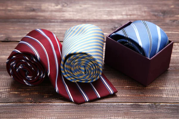 Colorful Neckties Brown Wooden Table — Stock Photo, Image