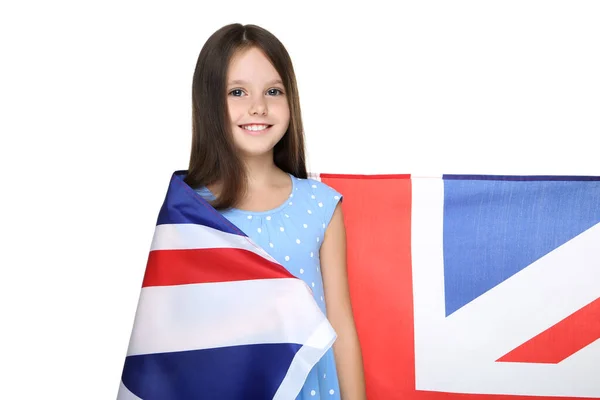 `Young girl wrapped in british flag on white background