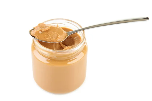 Erdnussbutter Glas Mit Löffel Isoliert Auf Weißem Hintergrund — Stockfoto