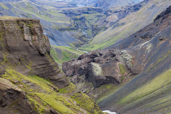 Skogar river canyon with green vegetation and wierd rock formations South of Iceland near Thorsmork