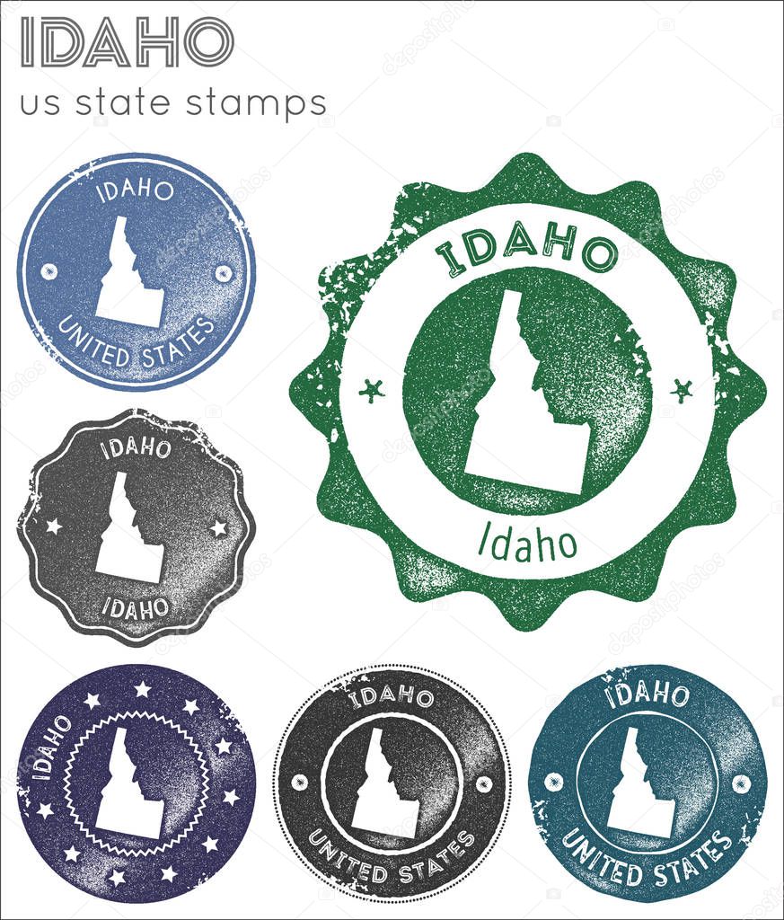 Idaho stamps collection. Rubber stamps with us state map silhouette. Vector set of Idaho logo.