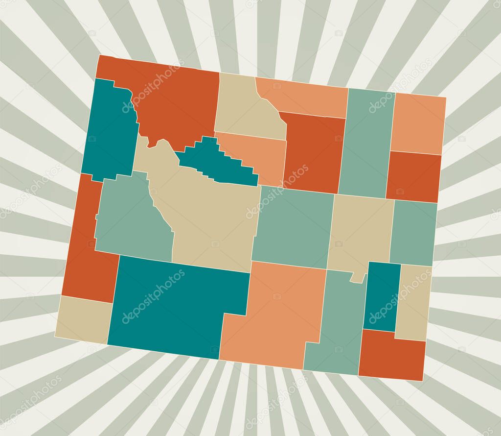 Wyoming map Poster with map of the us state in retro color palette Shape of Wyoming with sunburst