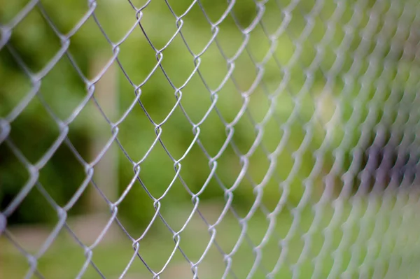 Abstrakt bild av ett nät staket. — Stockfoto