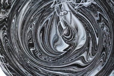 iki renk soyut görüntü karıştırma. Beyaz ve siyah boya dairelerinin dokusu