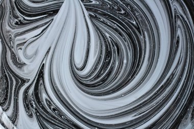 iki renk soyut görüntü karıştırma. Beyaz ve siyah boya dairelerinin dokusu