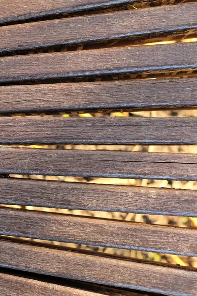 La superficie delle tavole inchiodate dipinte di marrone. Immagine di sfondo — Foto Stock