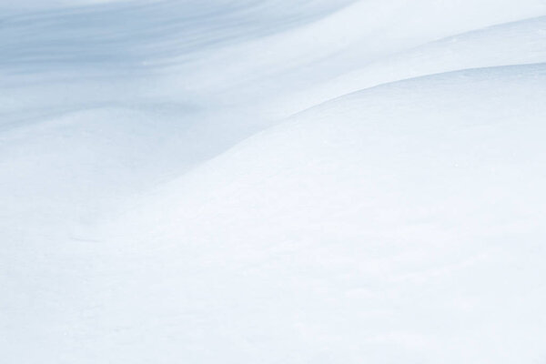 Fresh snow background texture. Winter background with snowflakes and snow mounds. Snow lumps.