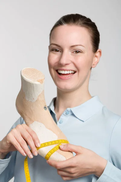 Female Orthopedic Shoemaker Measuring Handmade Wooden Last Gives Big Smile — Stock Photo, Image