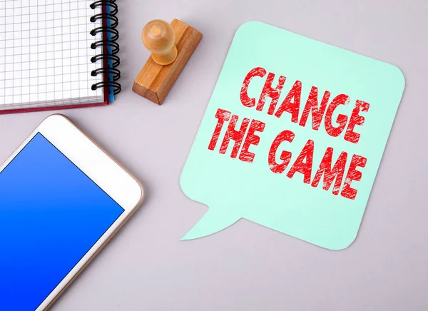Change The Game. Business and social media concept. Paper speech bubble
