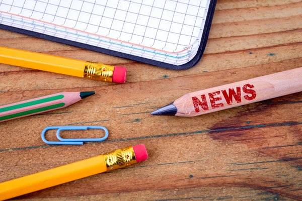 News text on pencil. Social media, propaganda and information — Stock Photo, Image