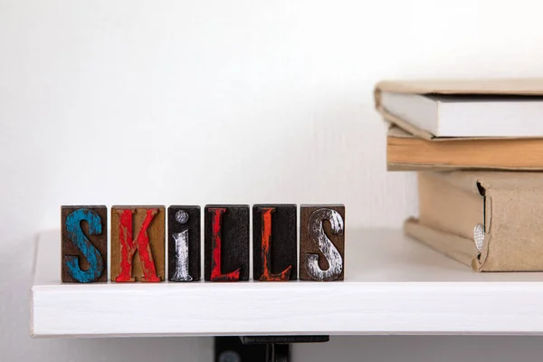 skills - word from colored wooden letters