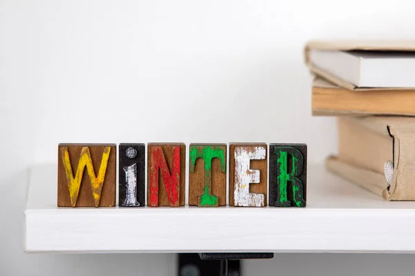 Winter word from colored wooden letters — Stock Photo, Image