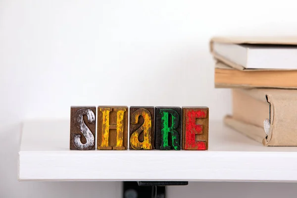 Share word from colored wooden letters