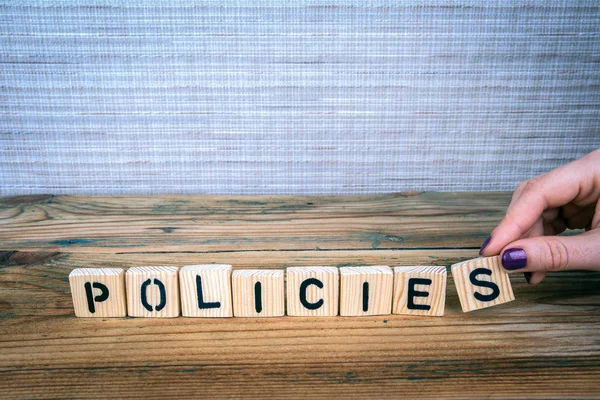 Policies concept. Wooden letters on the office desk — 스톡 사진