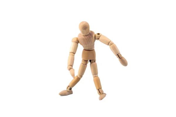 Modelo humano de madera sobre un fondo blanco — Foto de Stock