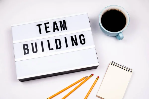 Trabajo en equipo. Texto en caja de luz — Foto de Stock