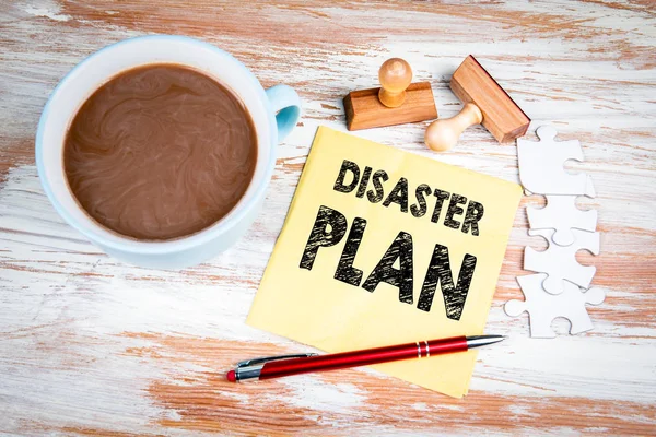 Disaster Plan concept. Text on a napkin