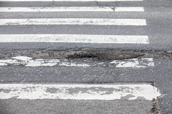 Damaged asphalt road with potholes — Stock Photo, Image