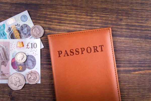 UK pound and passport. Travel to Great Britain concept