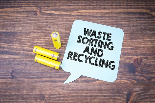 Waste sorting and recycling. AA size batteries