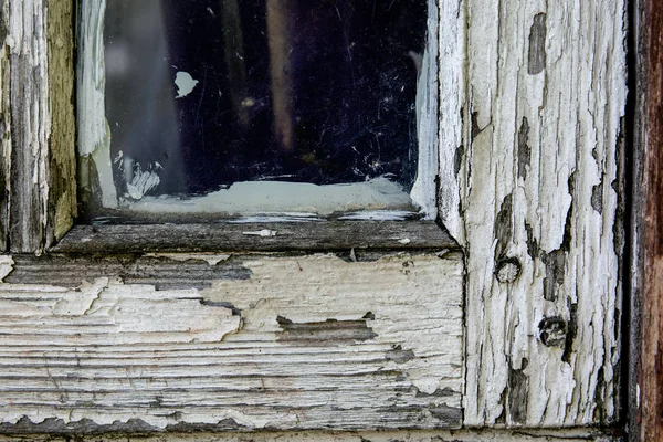Old window pane with peeled of white color — Stock Photo, Image