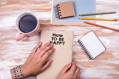 Nasıl mutlu olunacak. El tutan kitap