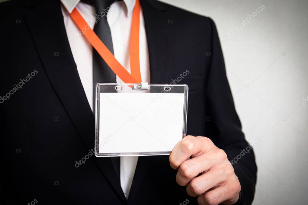 Businessman showing a white empty staff identity mockup
