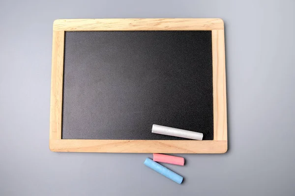 Chalkboard on a gray background — Stock Photo, Image