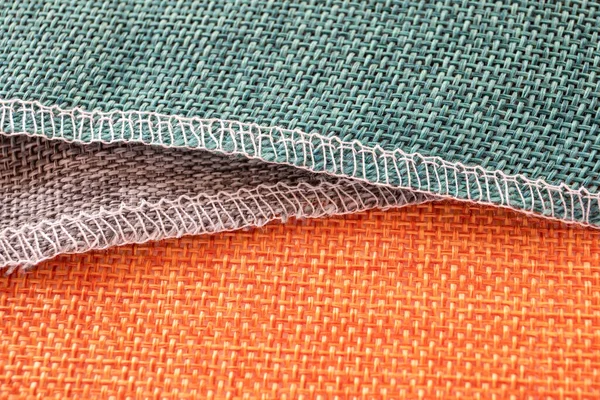 Orange, grå, gröna textilier. Tyg för dekoration, brodyr — Stockfoto