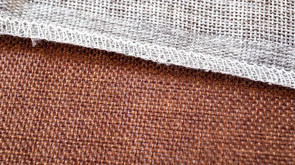 Grå och bruna textilier. Tyg för dekoration, brodyr — Stockfoto