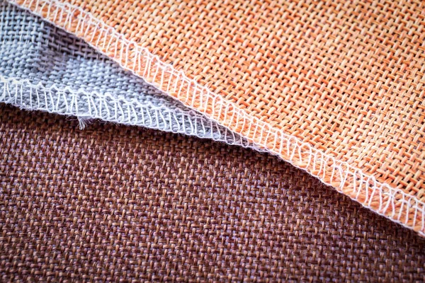 Brun, grå och orange textil. Vävnader för dekoration, broderi, bakgrunder — Stockfoto