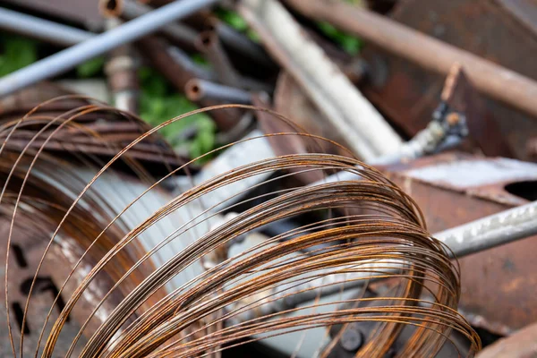 Stack of scrap metal, rusty wires in front. Recycling and garbage — Stock Photo, Image