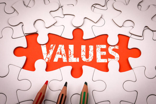 Концепция основных ценностей, представленная как часть головоломки.