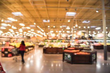 Soyut organik taze üretir bulanıklık, meyve ve sebze raflarda Humble, Texas, bizi saklamak. Bulanık süper market, bakkal alışveriş, bokeh açık renkli müşteriler ile. Sağlıklı kavramı.