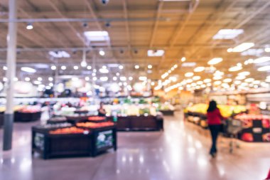 Vintage bulanıklık soyut organik taze üretir, meyve ve sebze raflarda Humble, Texas, bizi saklamak. Bulanık süper market, bakkal alışveriş müşteriler ve bokeh açık renkli