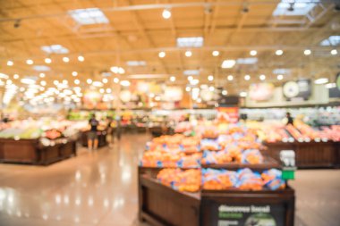 Soyut organik taze üretir bulanıklık, meyve ve sebze raflarda Humble, Texas, bizi saklamak. Bulanık süper market, bakkal alışveriş, bokeh açık renkli müşteriler ile. Sağlıklı kavramı.