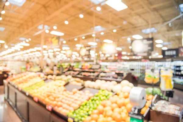 Soyut organik taze üretir bulanıklık, meyve ve sebze raflarda Humble, Texas, bizi saklamak. Bulanık süper market, bakkal alışveriş, bokeh açık renkli müşteriler ile. Sağlıklı kavramı.