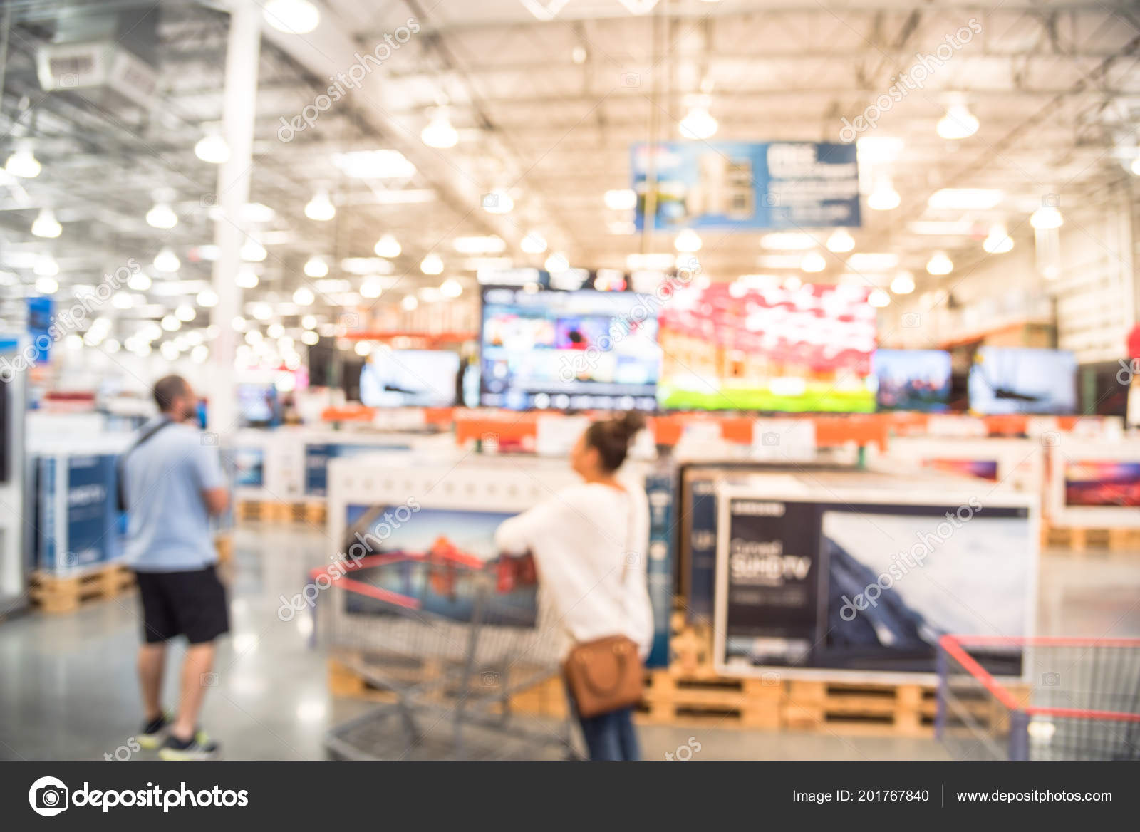 Blurred Customer Shopping Electronic Department Television Retail Shop