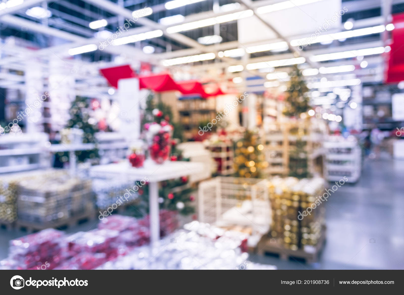 blurred colorful row shelves of plastic christmas bell ornaments garlands lightings and artificial christmas tree decoration for sale in large furniture - Large Plastic Christmas Bell Decorations blurred colorful row shelves of plastic christmas bell ornaments garlands lightings and artificial christmas tree decoration for sale in large furniture - Large Plastic Christmas Bell Decorations