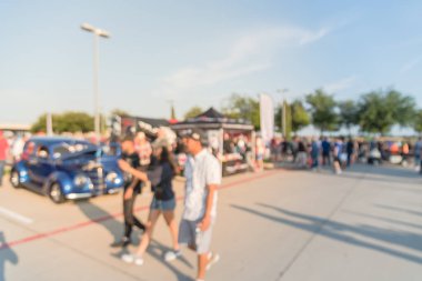 Hareket Dallas, Texas, ABD Yerel otomobil katılan kişi çeşitli grup bulanık. Bütün yıl, marka ve model satıcı, Organizatör çadır yakınındaki araçların tarama bulanık meşgul insanlar