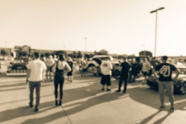 Bulanık hareket Dallas, Texas, ABD yerel otomobil katılan kişi çeşitli grup. Meşgul insanlar tüm yıl, marka ve model araçların tarama.