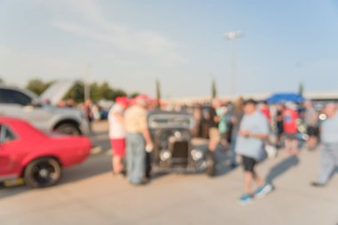 Bulanık hareket Dallas, Texas, ABD yerel otomobil katılan kişi çeşitli grup. Meşgul insanlar tüm yıl, marka ve model araçların tarama.