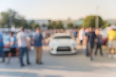 Bulanık hareket Dallas, Texas, ABD yerel otomobil katılan kişi çeşitli grup. Meşgul insanlar tüm yıl, marka ve model araçların tarama.