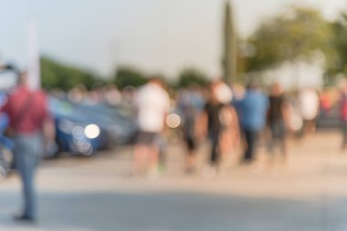 Bulanık hareket Dallas, Texas, ABD yerel otomobil katılan kişi çeşitli grup. Meşgul insanlar tüm yıl, marka ve model araçların tarama.