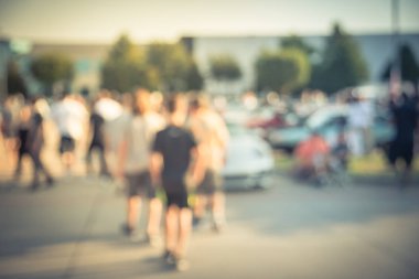 Bulanık hareket Dallas, Texas, ABD yerel otomobil katılan kişi çeşitli grup. Meşgul insanlar tüm yıl, marka ve model araçların tarama.