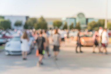 Bulanık hareket Dallas, Texas, ABD yerel otomobil katılan kişi çeşitli grup. Meşgul insanlar tüm yıl, marka ve model araçların tarama.