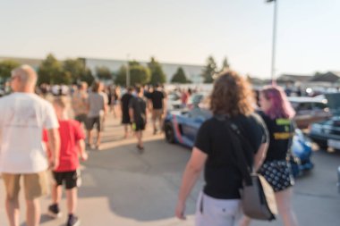 Bulanık hareket Dallas, Texas, ABD yerel otomobil katılan kişi çeşitli grup. Meşgul insanlar tüm yıl, marka ve model araçların tarama.